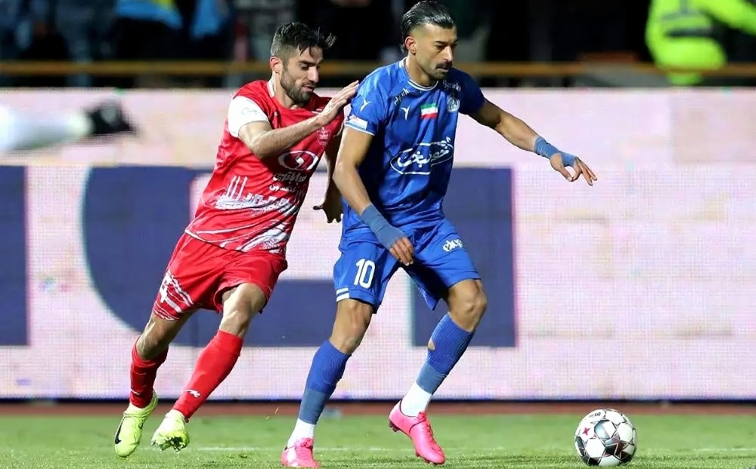 میلاد محمدی مدافع چپ پرسپولیس تهران و تیم ملی ایران - رامین رضاییان مدافع استقلال تهران و بازیکن سابق تیم ملی ایران، پرسپولیس و سپاهان - لیگ برتر ایران